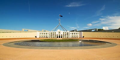 Super tax changes passed by parliament; but fight looms